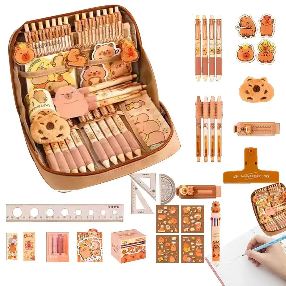 Stationery set with kawaii cute animal designs including pens, erasers, and rulers.