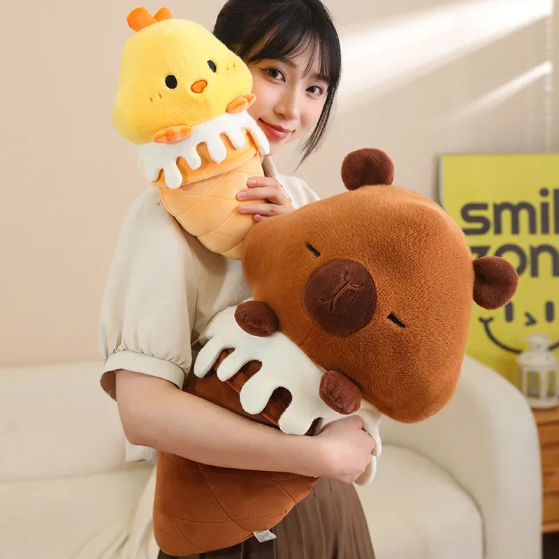 Person holding a kawaii plush toy with a chick design and another plush toy resembling a bear.