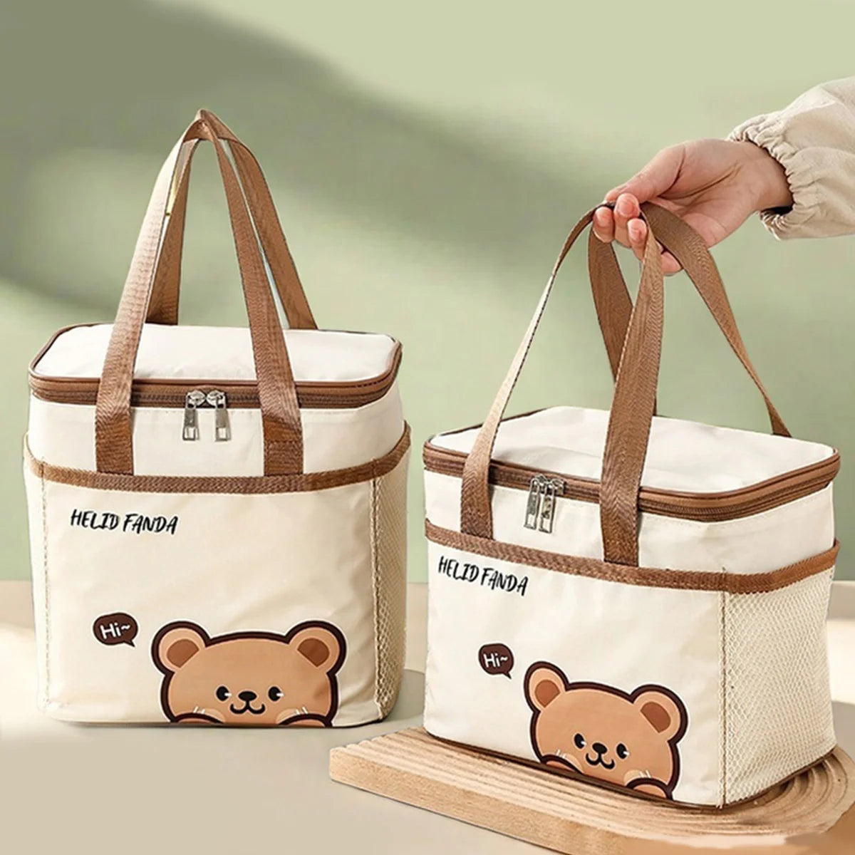 Two kawaii bear-themed bags with 'HELID FANDA' branding on a light green background.