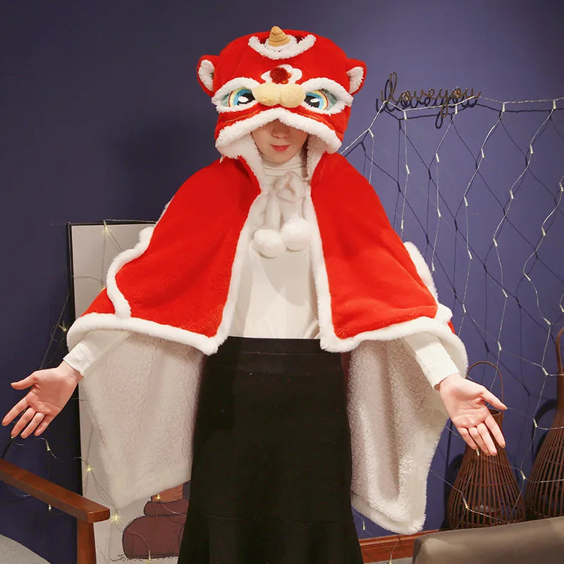Person wearing a red and white kawaii costume with a hood and mask, standing against a dark blue wall.