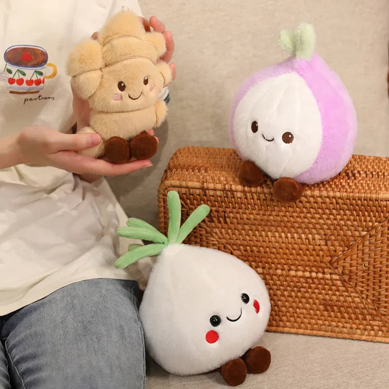 Kawaii plush toys resembling a mushroom, radish, and onion on a neutral background