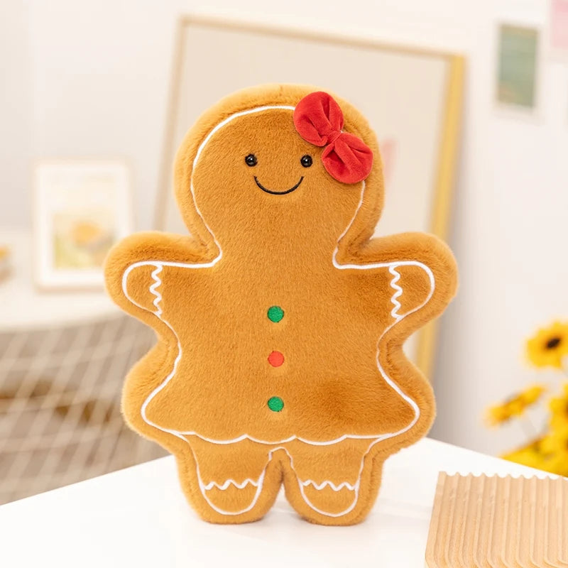 Plush gingerbread man kawaii toy with a red flower on a white surface