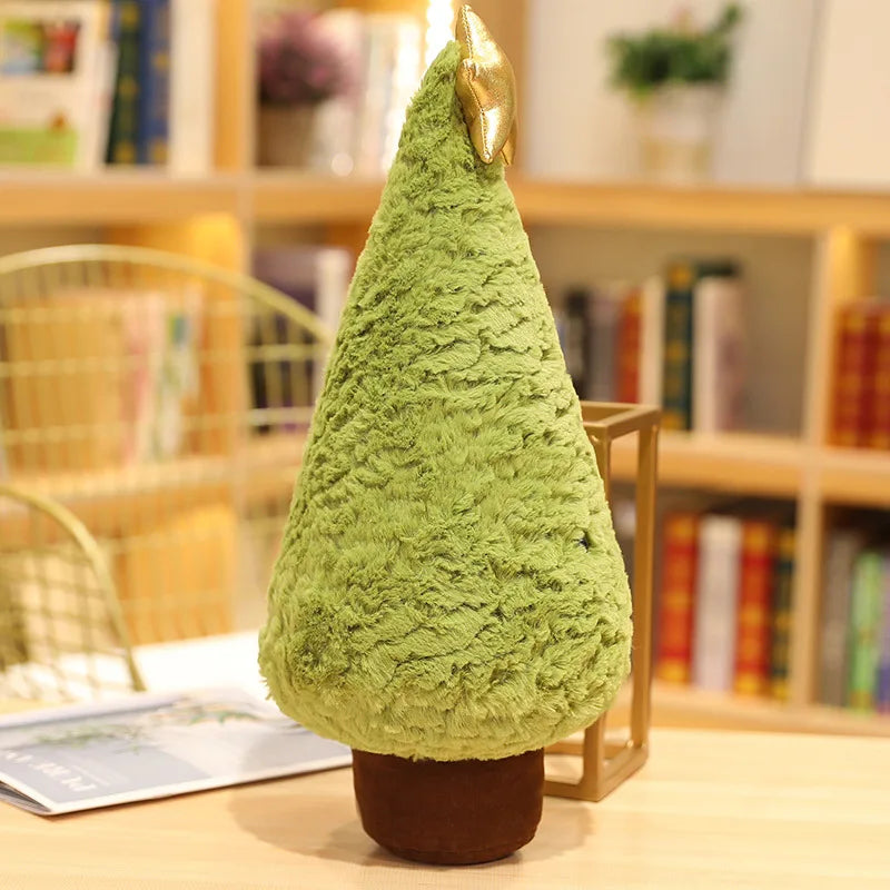 Green textured kawaii decorative tree on a table with a bookshelf in the background