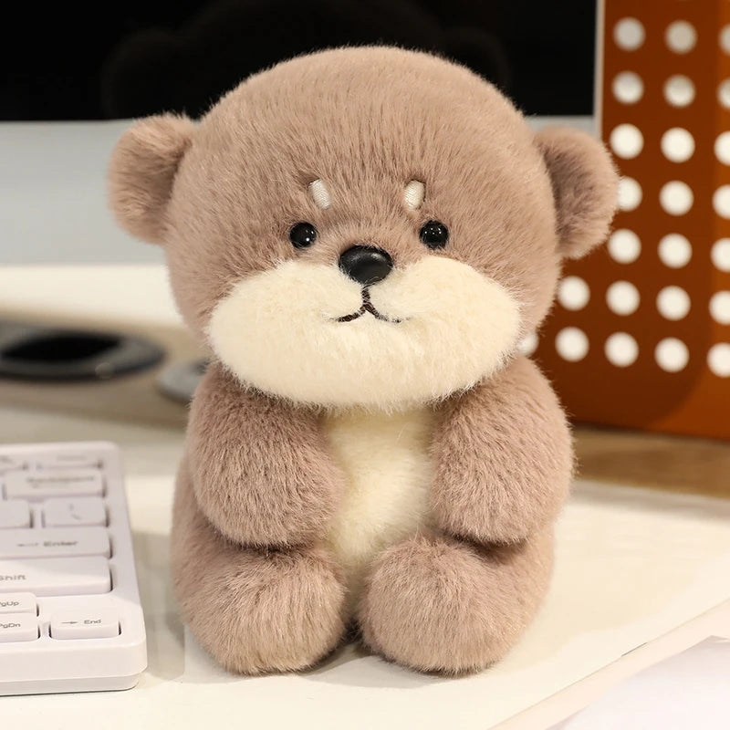 Plush teddy bear kawaii toy on a desk with office items in the background
