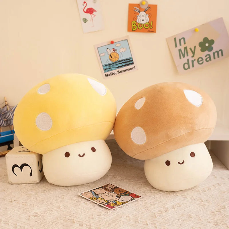 Two plush mushroom kawaii toys on a floor with decorative cards in the background.