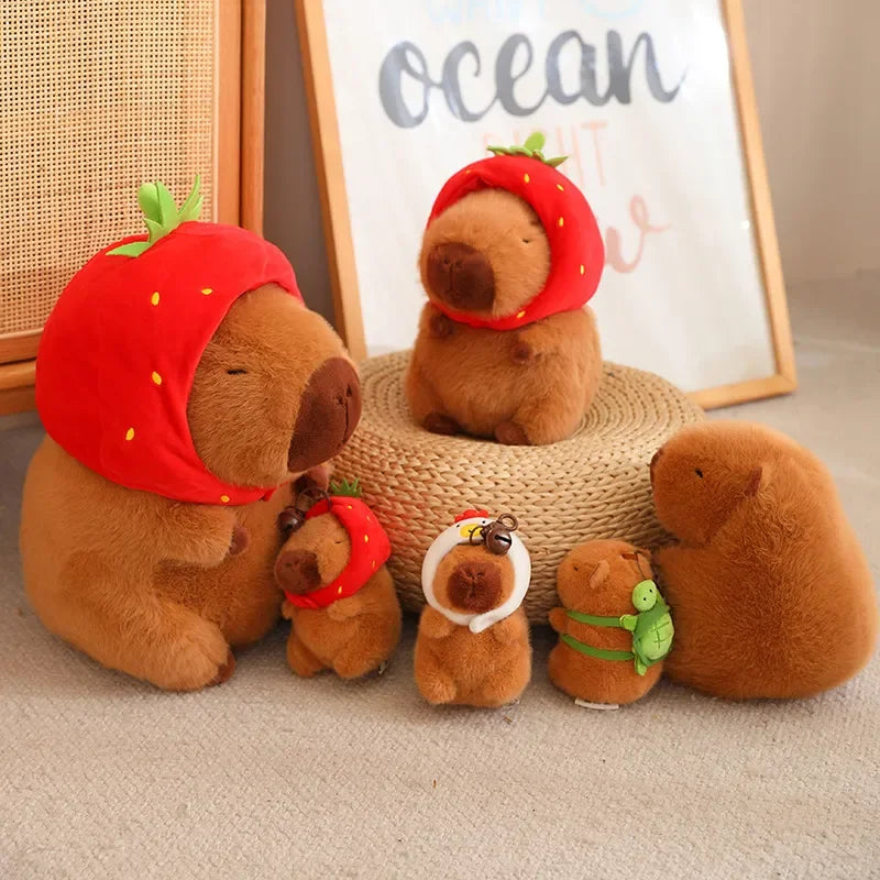 Set of brown teddy kawaii bears with strawberry hats on a textured surface.