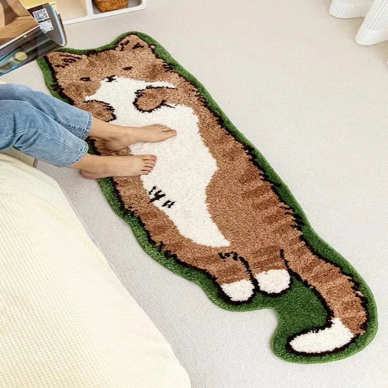 Kawaii cat-shaped rug on a light-colored floor with a person stepping onto it.