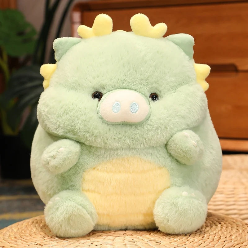 Kawaii plush toy with a green and yellow color scheme on a woven surface.