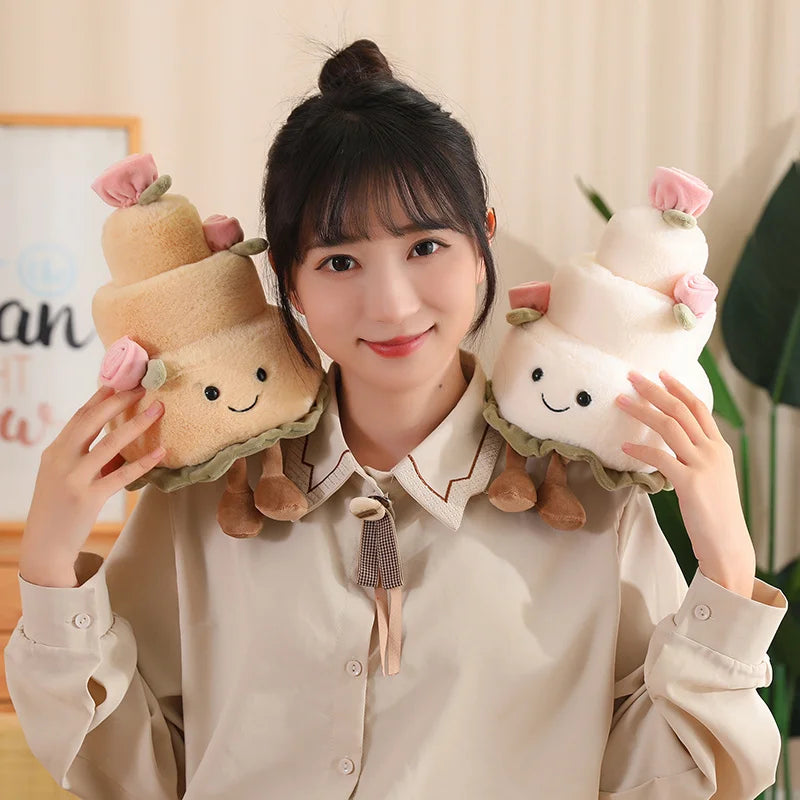 Person holding two cute plush kawaii toys resembling ice cream cones with faces.