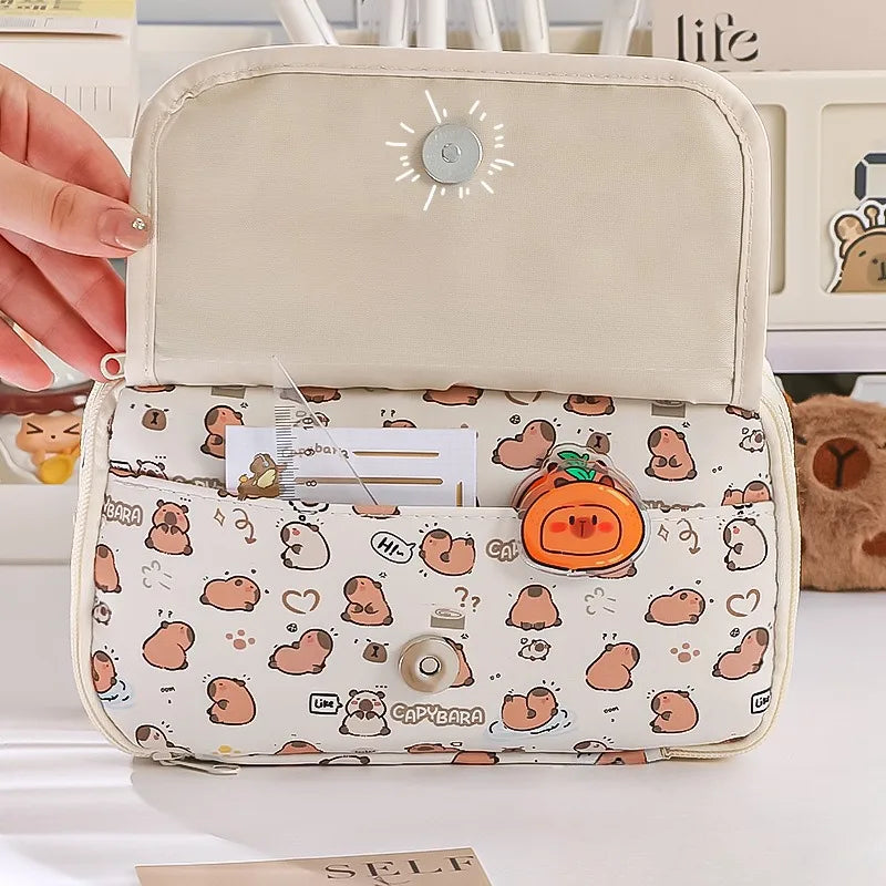 Small pouch with kawaii cartoon animal pattern held open by a hand