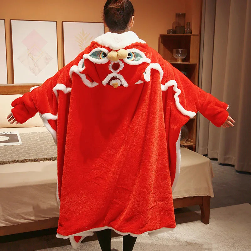 Person wearing a kawaii red dragon costume in a room with a bed and shelves.