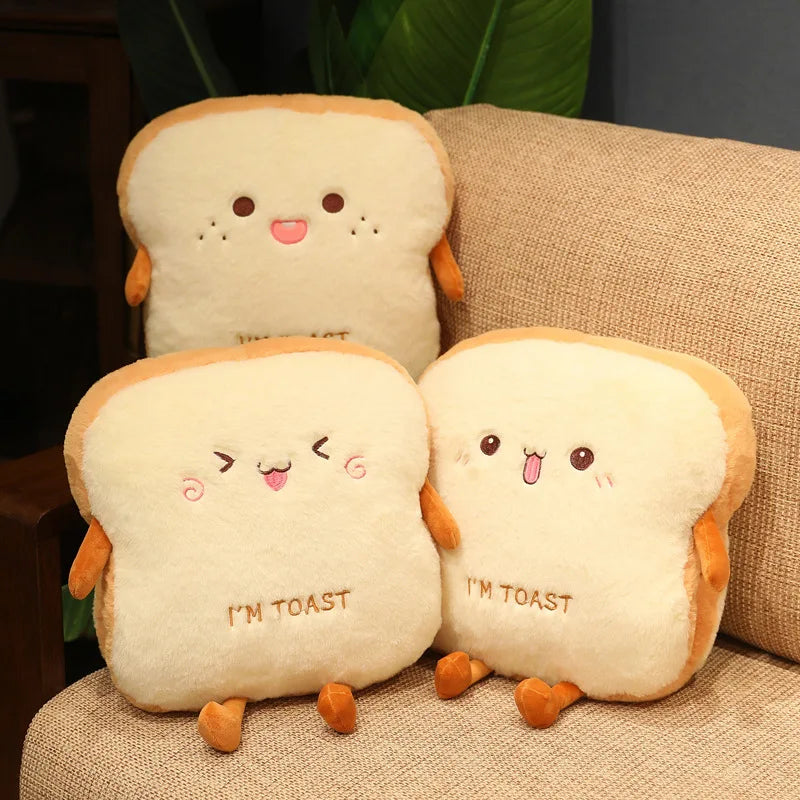Three cute plush toast kawaii toys sitting on a textured surface.