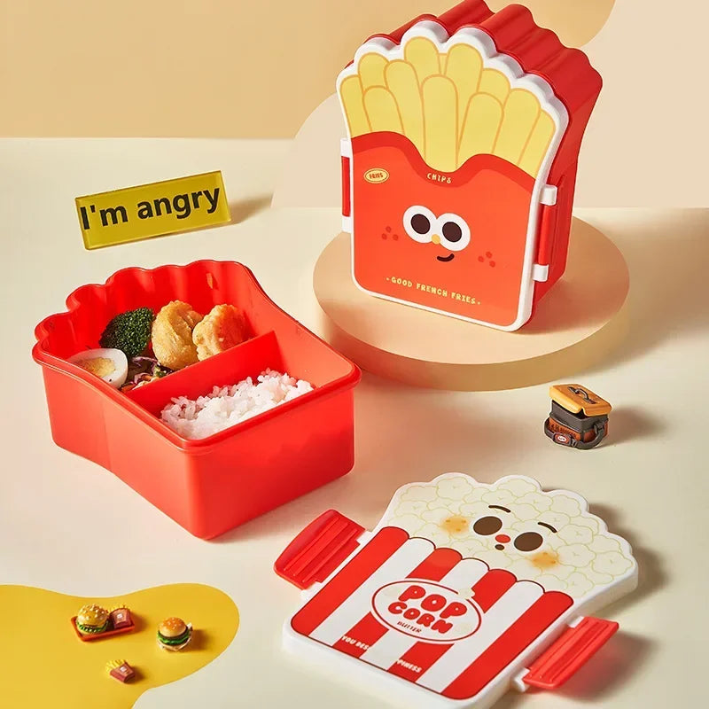 Red kawaii bento box with compartments, a cartoonish French fry container, and a popcorn container on a beige background.