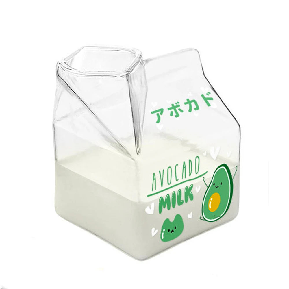 Clear Kawaii container filled with a white liquid, labeled 'Avocado Milk' with avocado graphics on a white background.