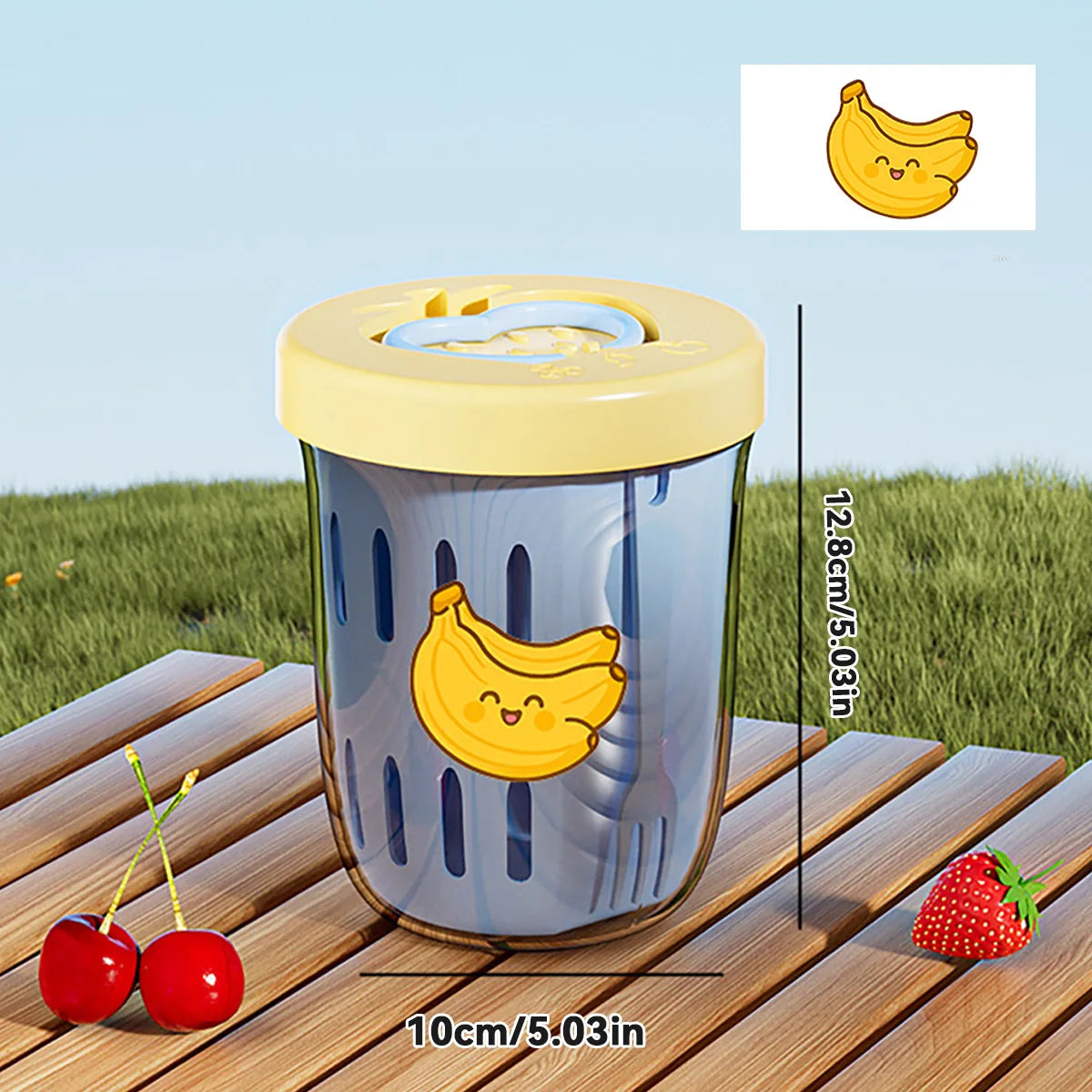 Clear container with Kawaii banana design on a wooden surface outdoors