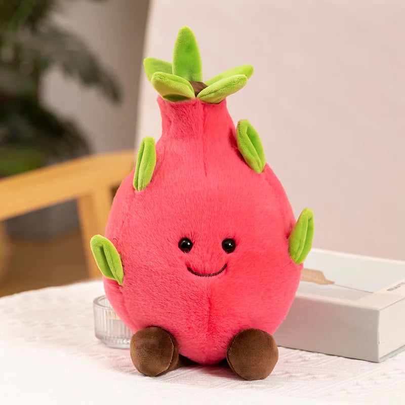 Plush dragon fruit kawaii toy with a happy face on a table