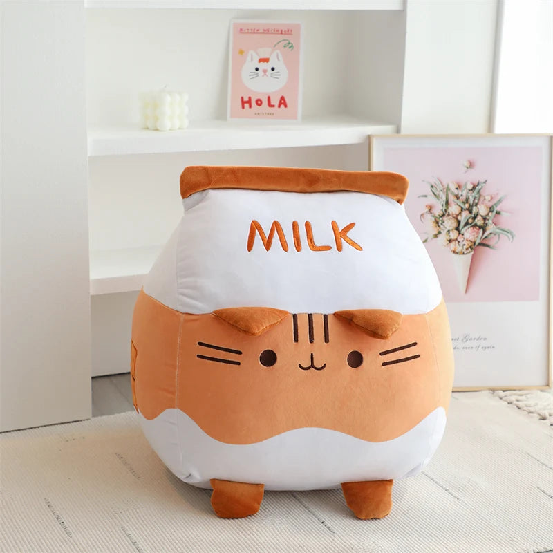 Cute kawaii plush toy shaped like a milk carton with a cat face on a light wooden floor.