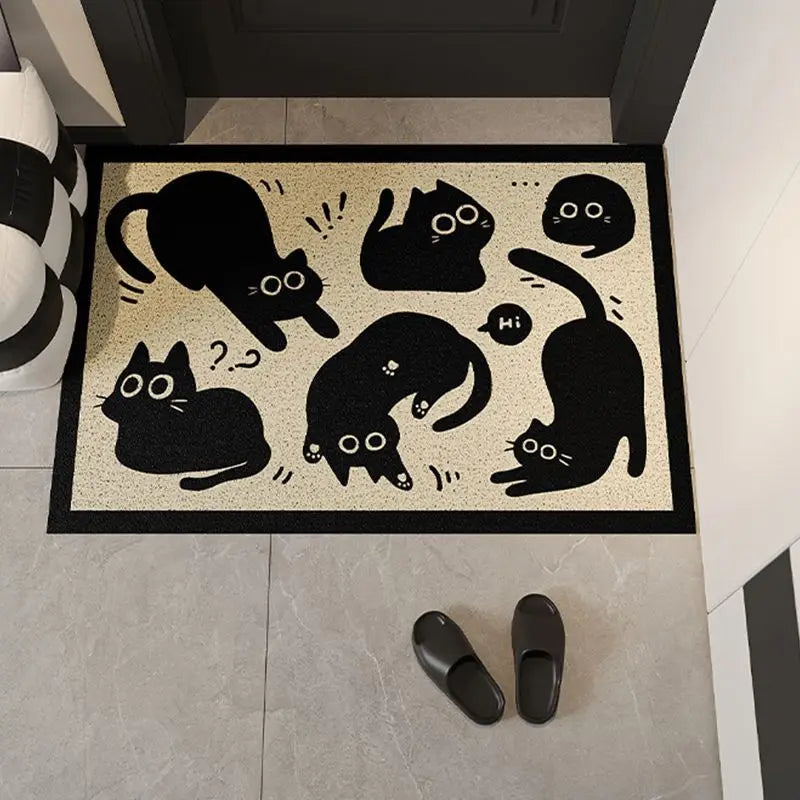 Doormat with Kawaii black cat illustrations on a beige background, placed on a tiled floor.
