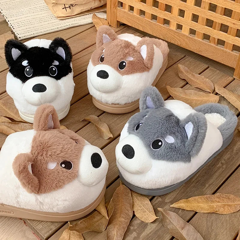 Four pairs of kawaii dog-shaped slippers on a wooden floor with leaves.