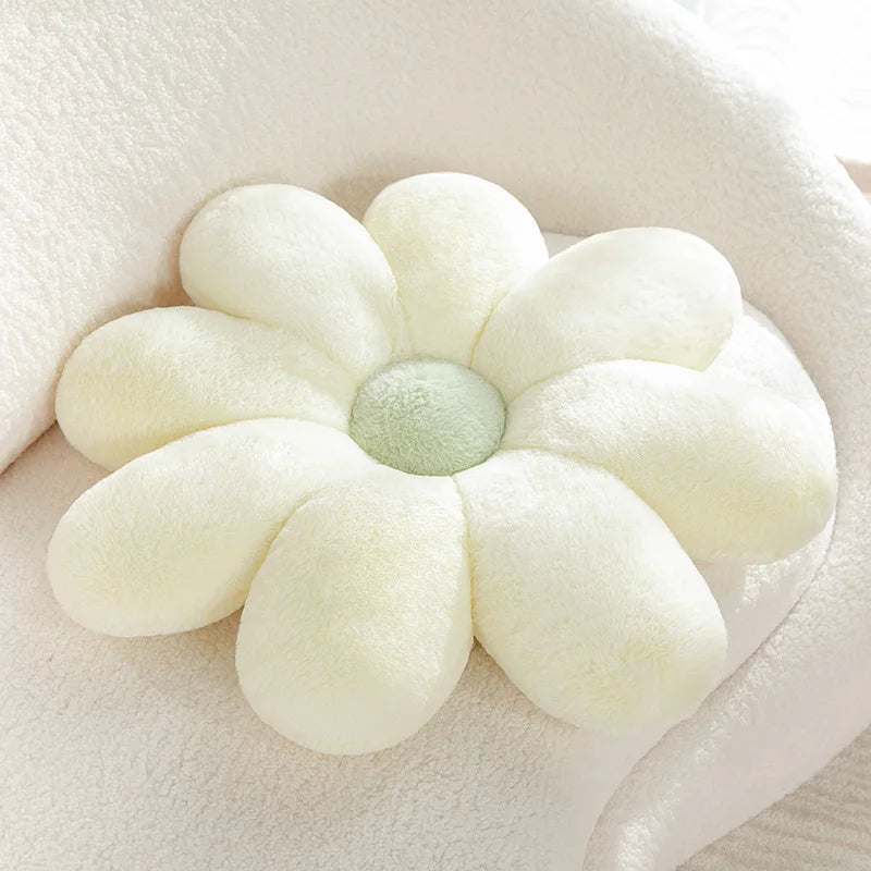 Flower-shaped Kawaii pillow with a green center on a soft beige background