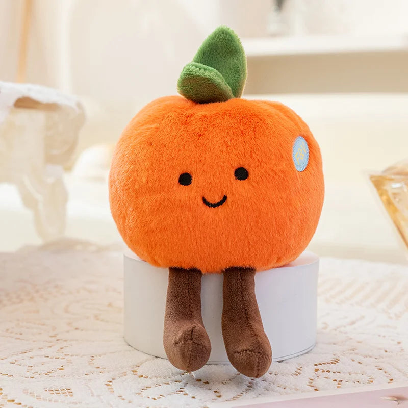 Plush kawaii toy shaped like a cartoon pumpkin on a white surface with a blurred background