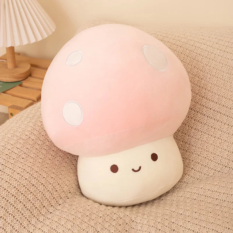 Cute mushroom-shaped plush kawaii toy with a smiling face on a textured surface