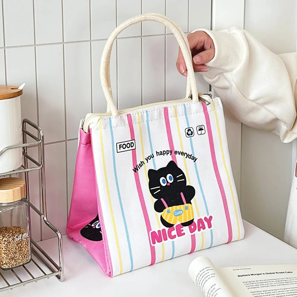 Colorful kawaii striped bag with a cartoon cat design held by a person in a kitchen.