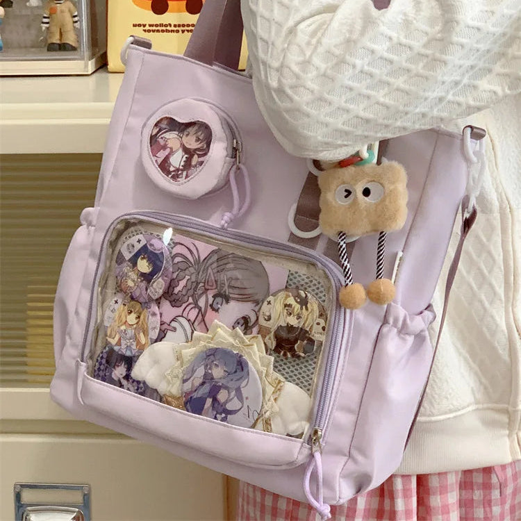 Light purple Kawaii backpack with various items including plush toys and stationery, held by a person.