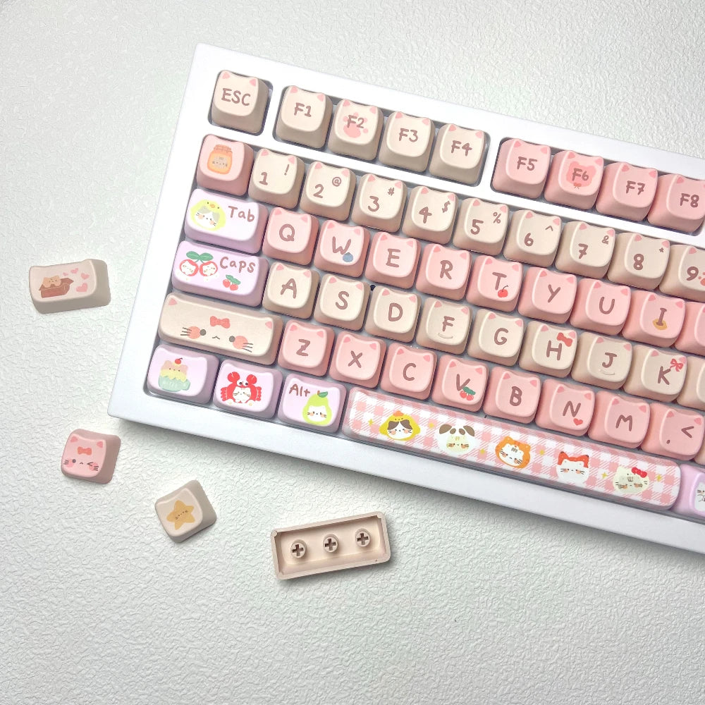 Keyboard with decorative Kawaii keycaps on a light gray background