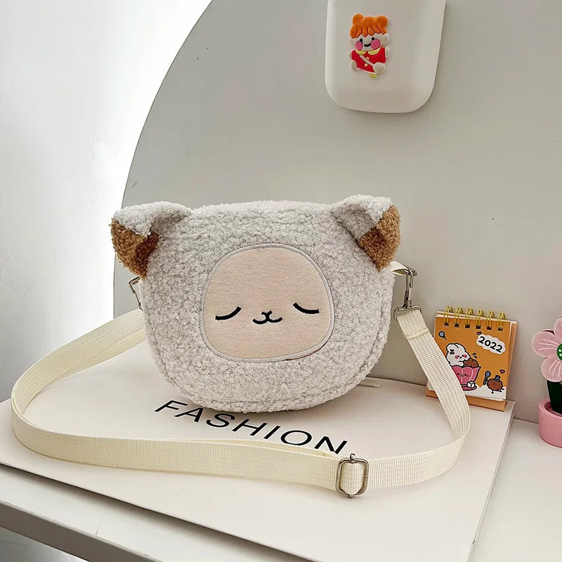 Fluffy Kawaii cat-shaped crossbody bag on a white surface with 'FASHION' text