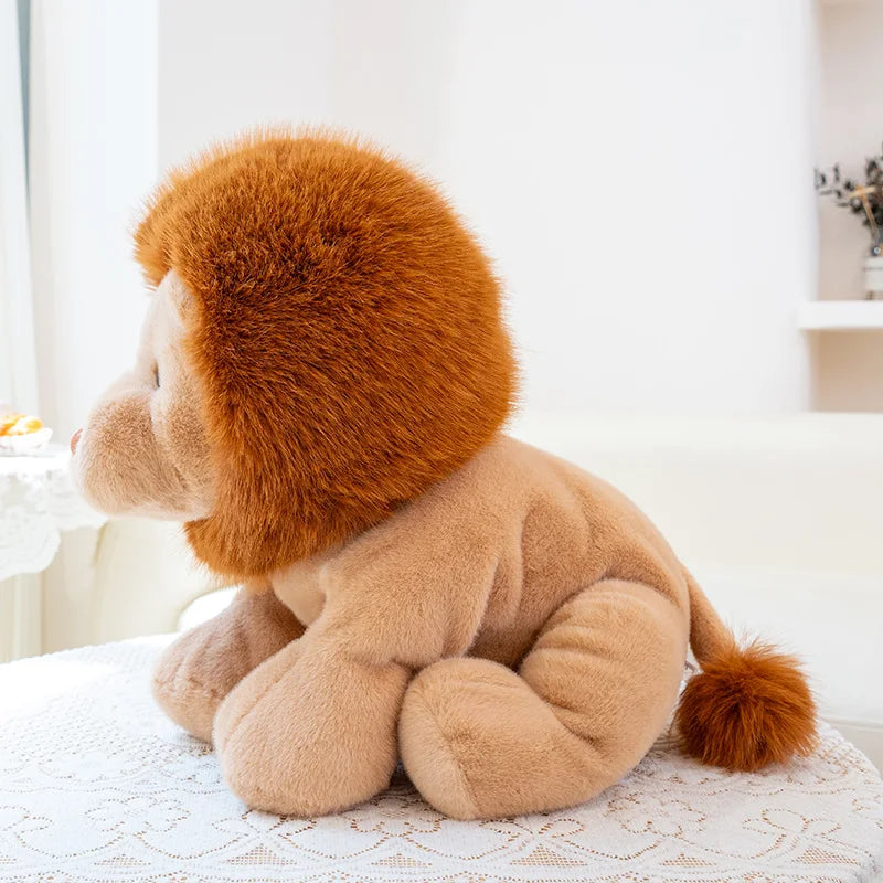 Kawaii plush lion toy on a white surface with a blurred background