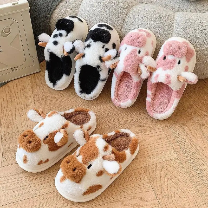 Four pairs of kawaii cartoon-themed slippers on a wooden floor.