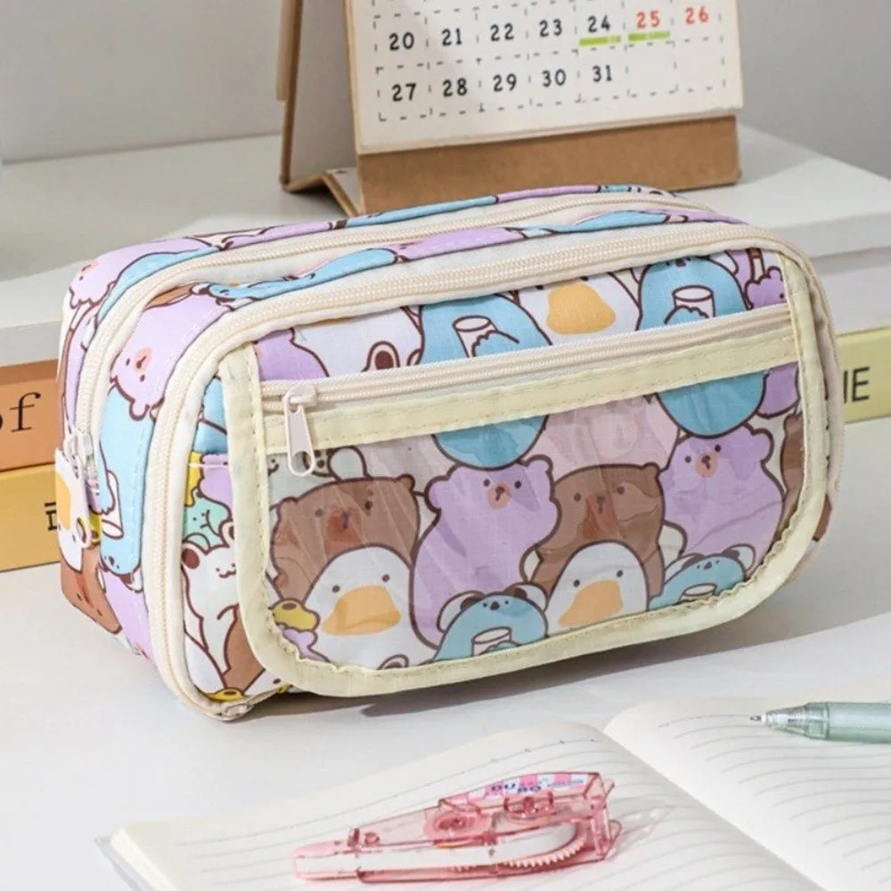 Pencil case with kawaii animal pattern on a desk with books and a calendar in the background