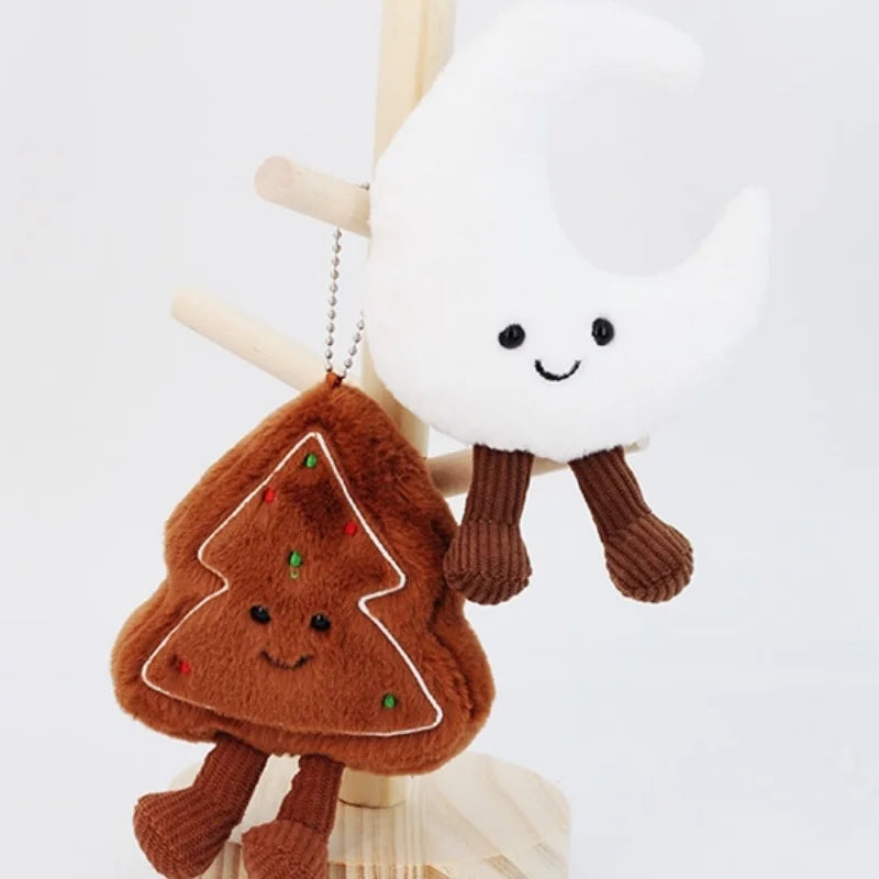 Plush toys shaped like a kawaii gingerbread man and a marshmallow on a white background