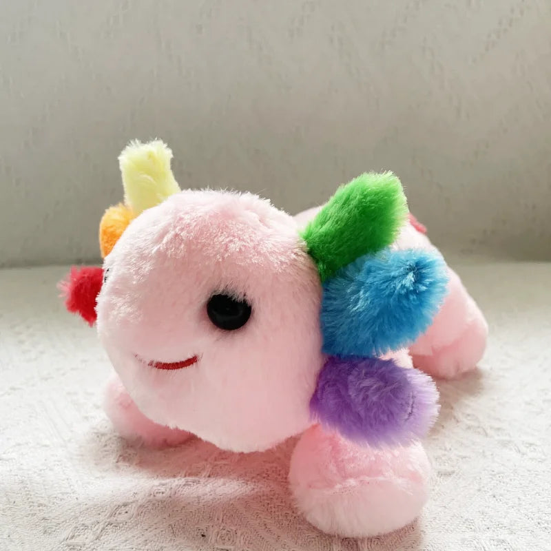 Kawaii plush toy with colorful pom-pom accents on a light background