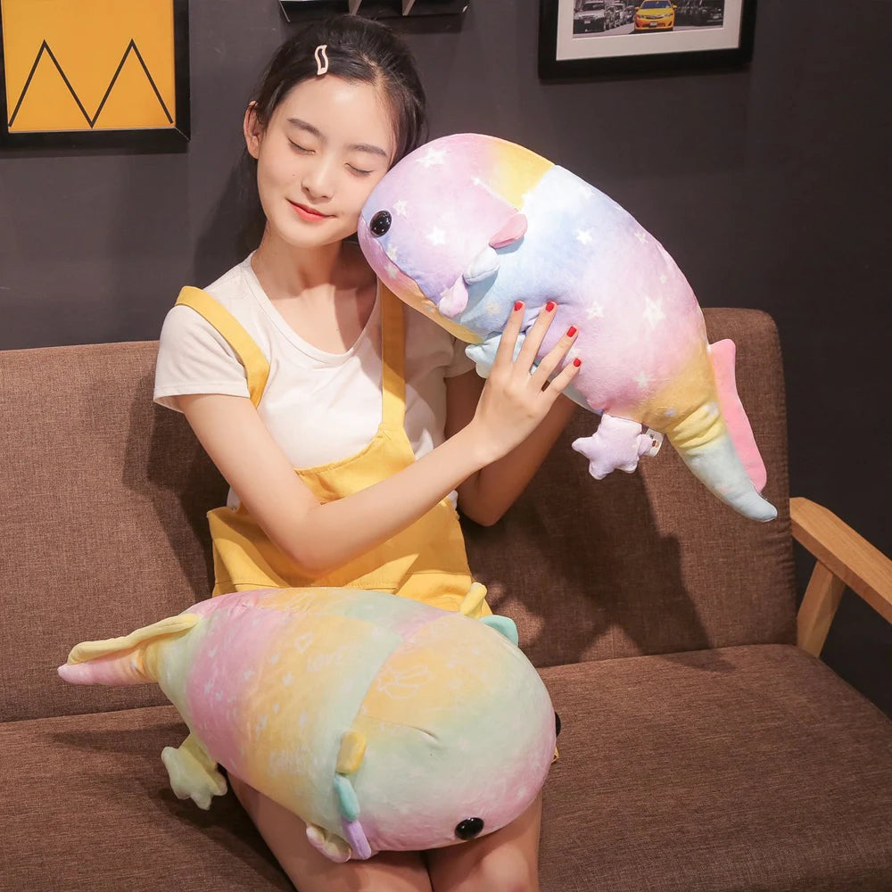 Woman holding a large, colorful kawaii plush toy on a couch