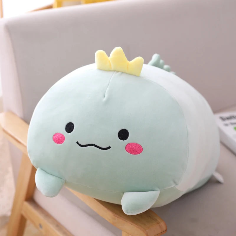Cute kawaii plush toy with a crown on a chair