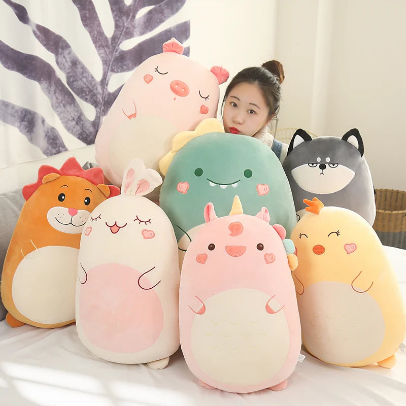 Person surrounded by kawaii colorful plush toys shaped like animals on a light background