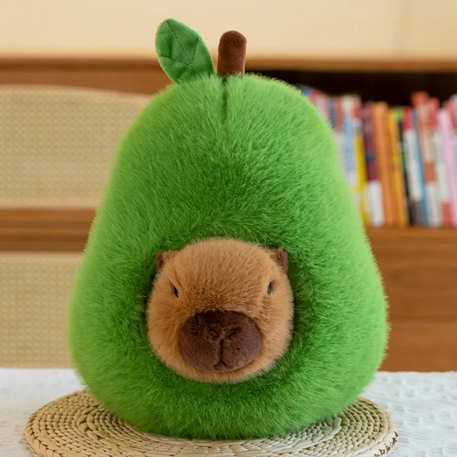 Green kawaii plush toy shaped like an avocado with a brown face on a woven mat.