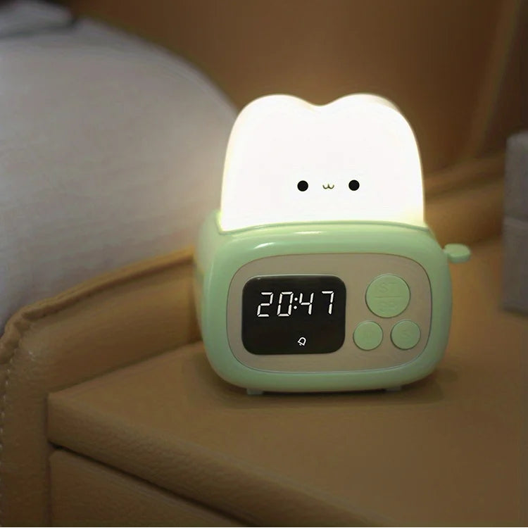 Cute kawaii night light with a digital clock display on a bedside table.