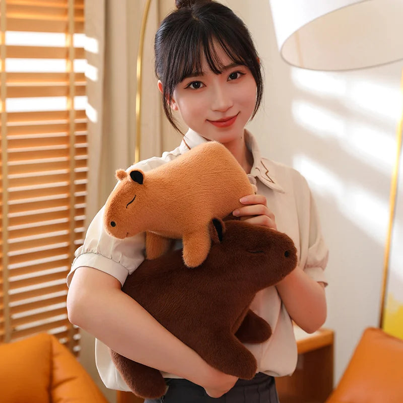 Person holding a kawaii plush toy in a warm indoor setting