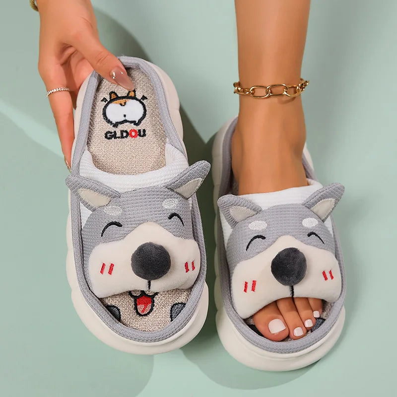 Gray cartoon kawaii slippers with a dog face design on a light green background
