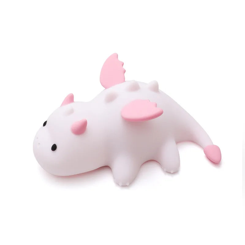 Cute kawaii cartoon-style axolotl toy with pink accents on a white background