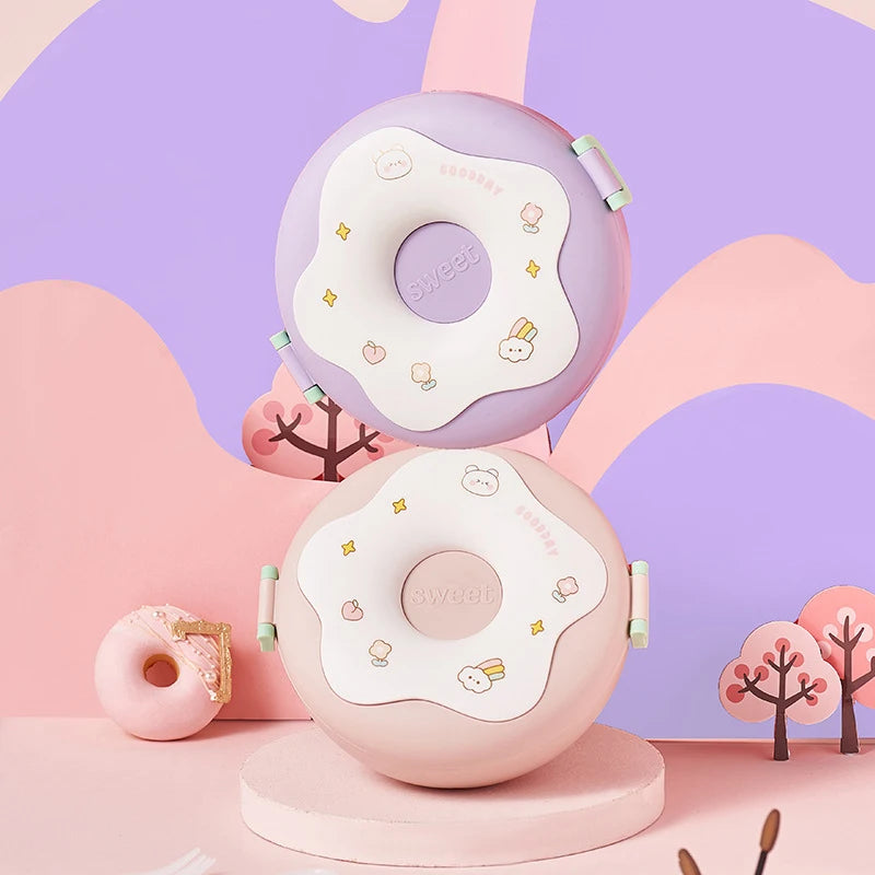 Two pink and purple kawaii donut-shaped devices with cartoon designs on a pastel background