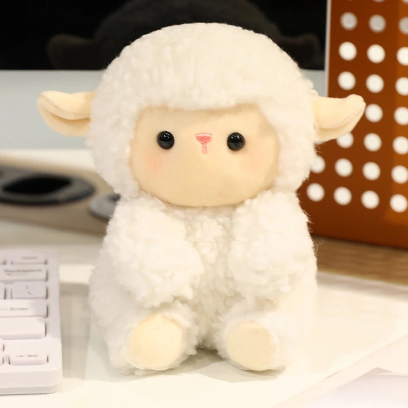 Plush kawaii toy sheep on a desk with office items in the background