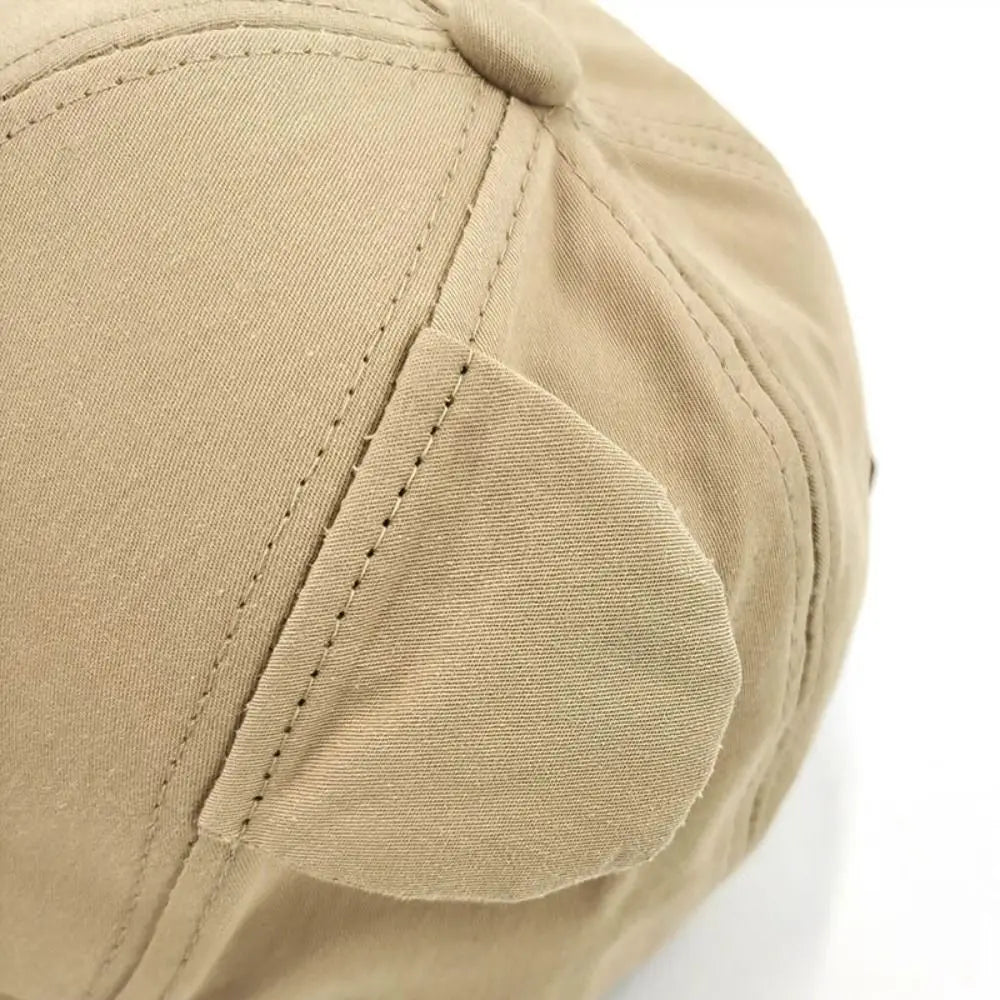 Close-up of a beige Kawaii cap with a white background
