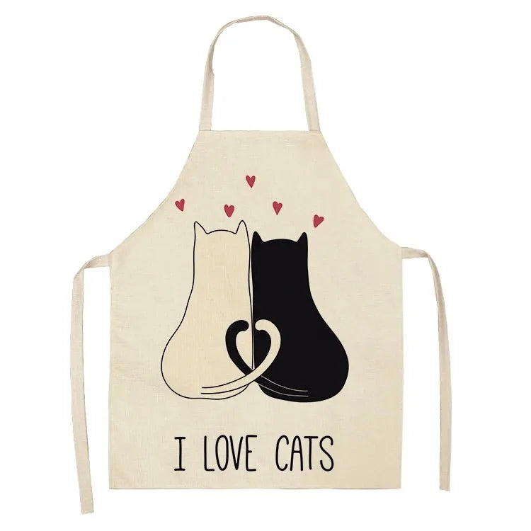 Beige apron with black and white cat Kawaii illustration and 'I Love Cats' text on a white background
