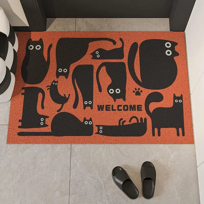 Doormat with Kawaii black cat illustrations and 'Welcome' text on an orange background