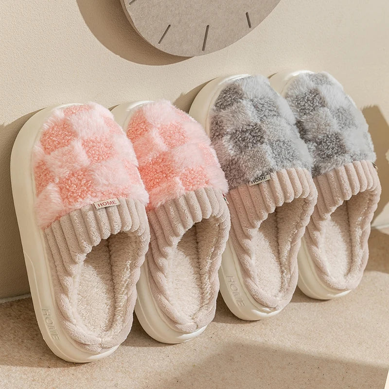 Two pairs of kawaii fluffy slippers in pink and gray on a neutral background
