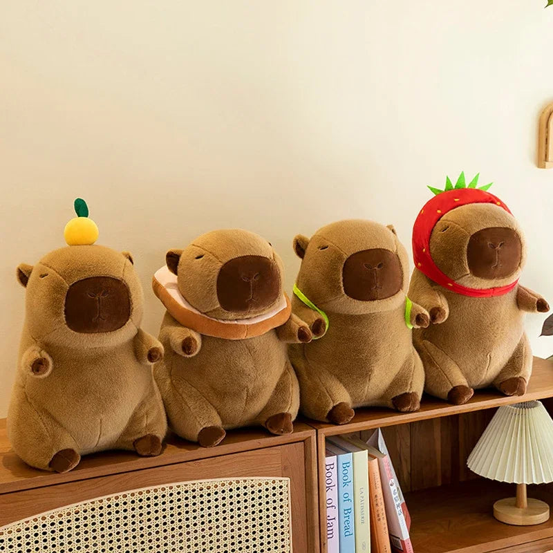 Four brown kawaii plush toys resembling animals on a wooden shelf.